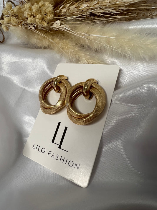 Two time gold earring